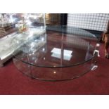 A Conran circular glass 2 tier coffee table, H.36 D.96cm