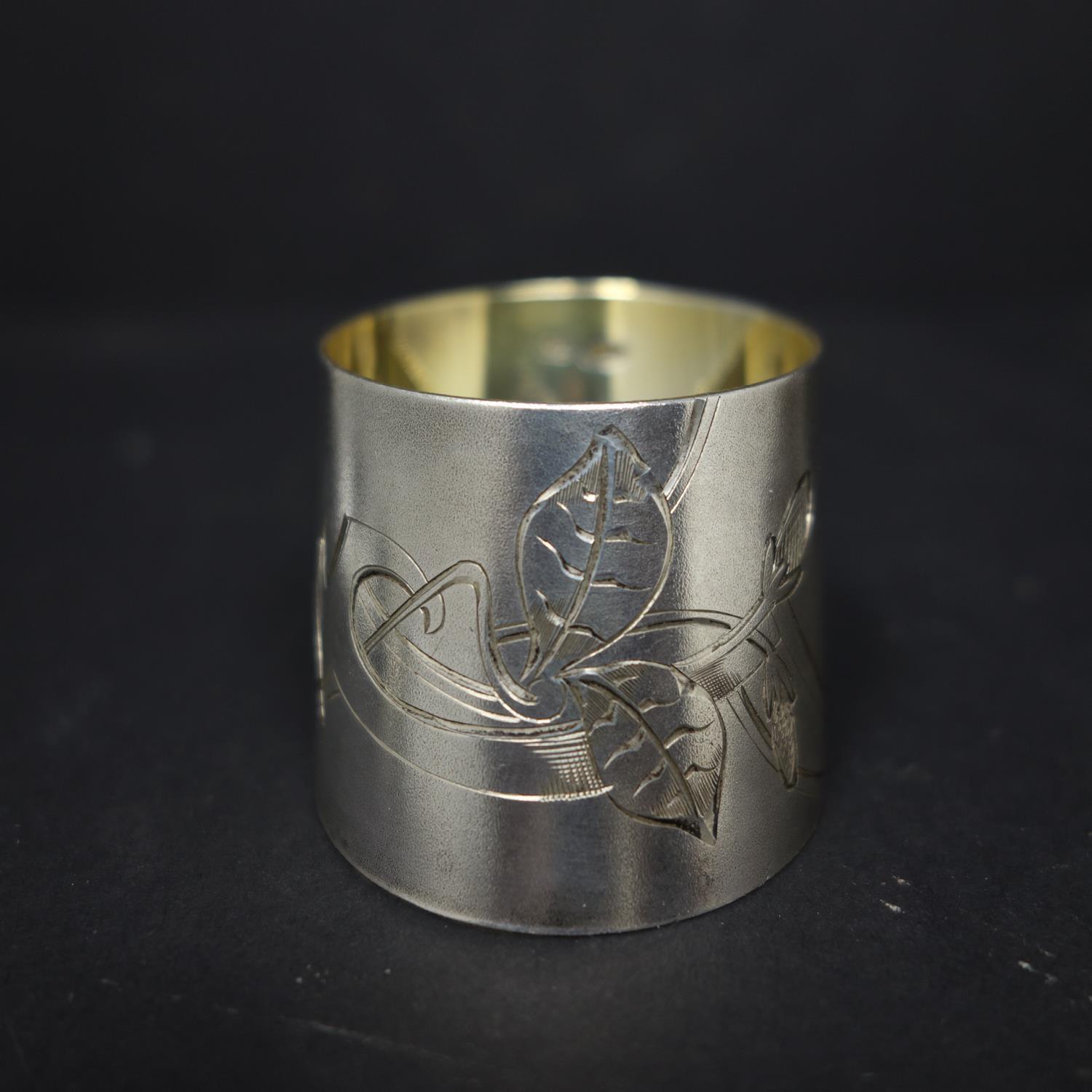 A collection of silver napkin rings, to include a Russian Art Nouveau example with gilded interior - Image 2 of 3
