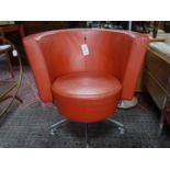 A Peter Maly design 'Circo' orange leather armchair for COR