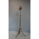 A Victorian brass telescopic oil lamp converted to electricity, missing one foot
