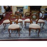 A set of 6 contemporary balloon back dining chairs