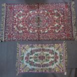 Two of Eastern embroidered wall hangings