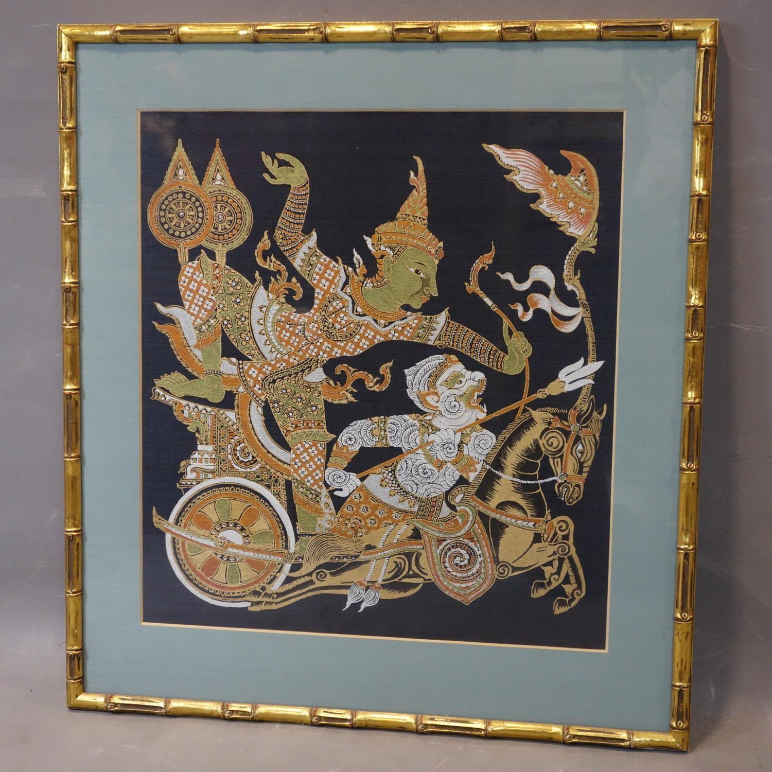 Contemporary Thai artist, warrior on a chariot (Dwarapala?), gutta pigments on bue silk, framed - Image 2 of 2