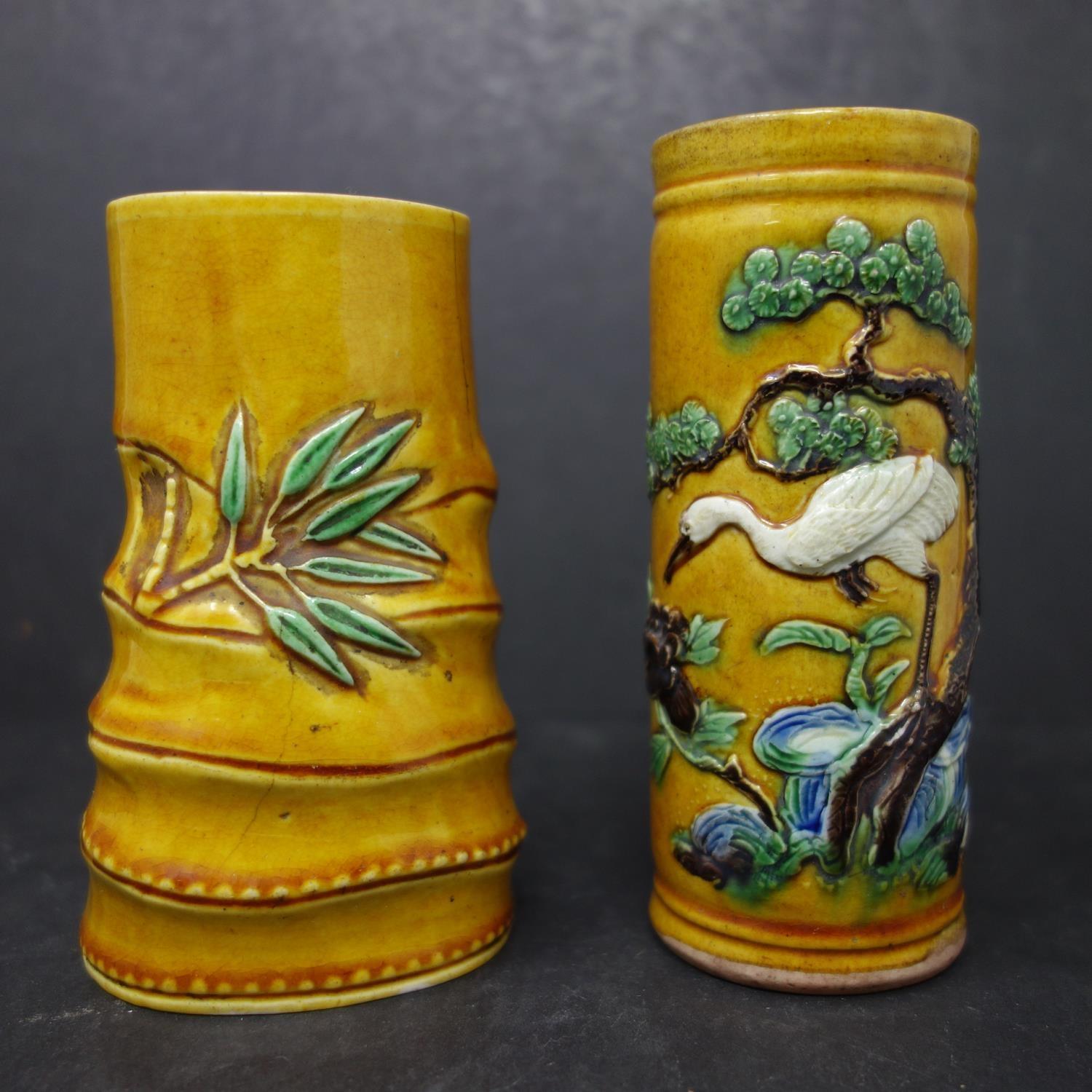 Two late 19th/early 20th century Chinese yellow glazed pots, H.12cm