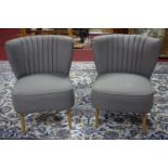 A pair of retro style cocktail chairs from John Lewis
