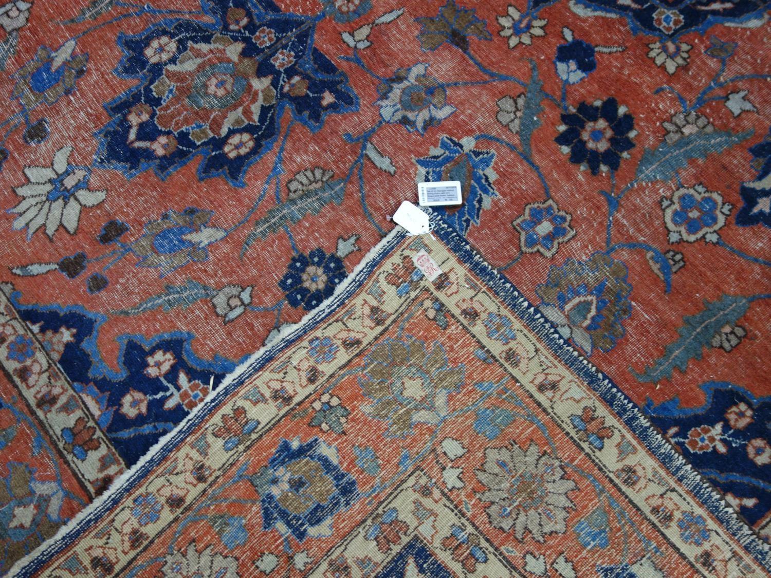 An early 20th century north east Persian Meshad carpet, the central blue floral medallion, on a - Bild 5 aus 6