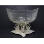 A German silver and crystal center piece, the hobnail cut navette shaped crystal bowl resting on