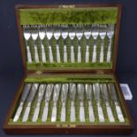 A set of 12 late 19th/early 20th century silver plated fish knives and forks, with mother of pearl