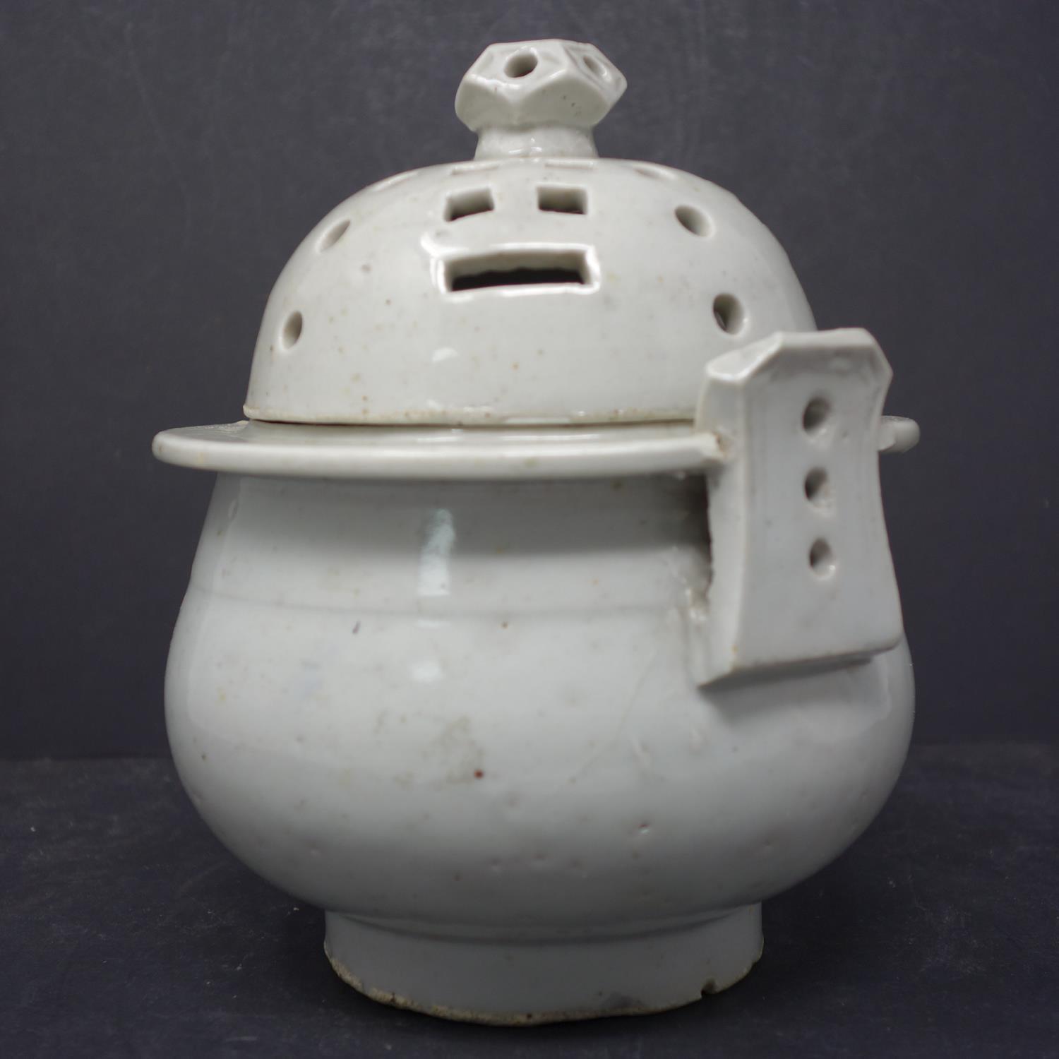 A Korean white glazed porcelain censer & cover, the cover pierced with trigrams, H.28, diam. 15 cm - Image 2 of 3