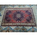 A North West Persian Tafresh rug, central double pendant medallion with repeating petal motifs on