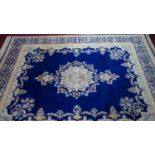 A Central Persian Kirman carpet, central double pendant medallion with repeating floral motifs on