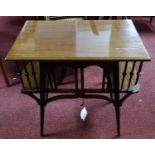 An Art Nouveau oak table of Godwin design, retailed by Goodyers, bearing label to verso, the
