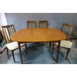 A 20th century G-plan teak dining table and 4 matching chairs