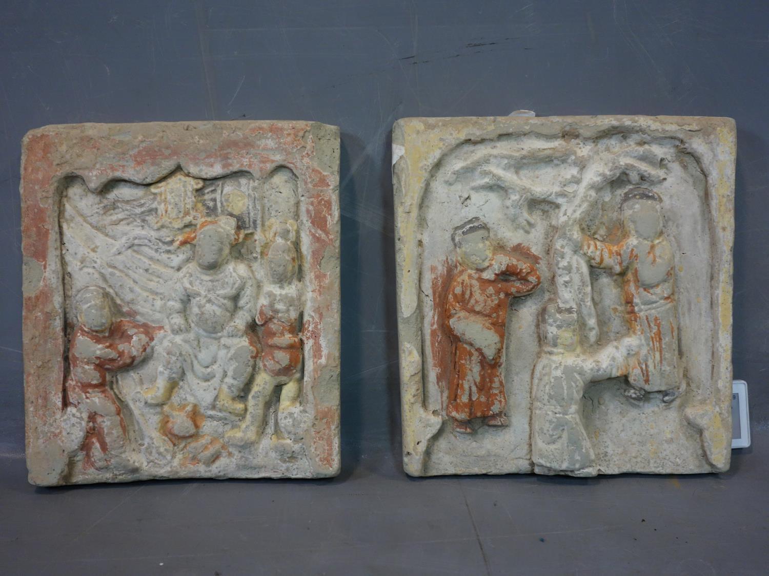 Pair of Han Dynasty hand painted pottery tiles representing domestic scenes, circa 200 BC - 200 AD