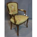 Early 20th century walnut armchair with flower upholstery, H.90, W.54 x D. 45cm