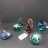 A Collection of 7 art glass paperweights to include a Caithness example