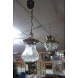 Two brass and glass ceiling lights