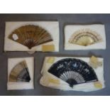 A collection of four 19th century decorative fans, to include a large silk and ebonised wood fan