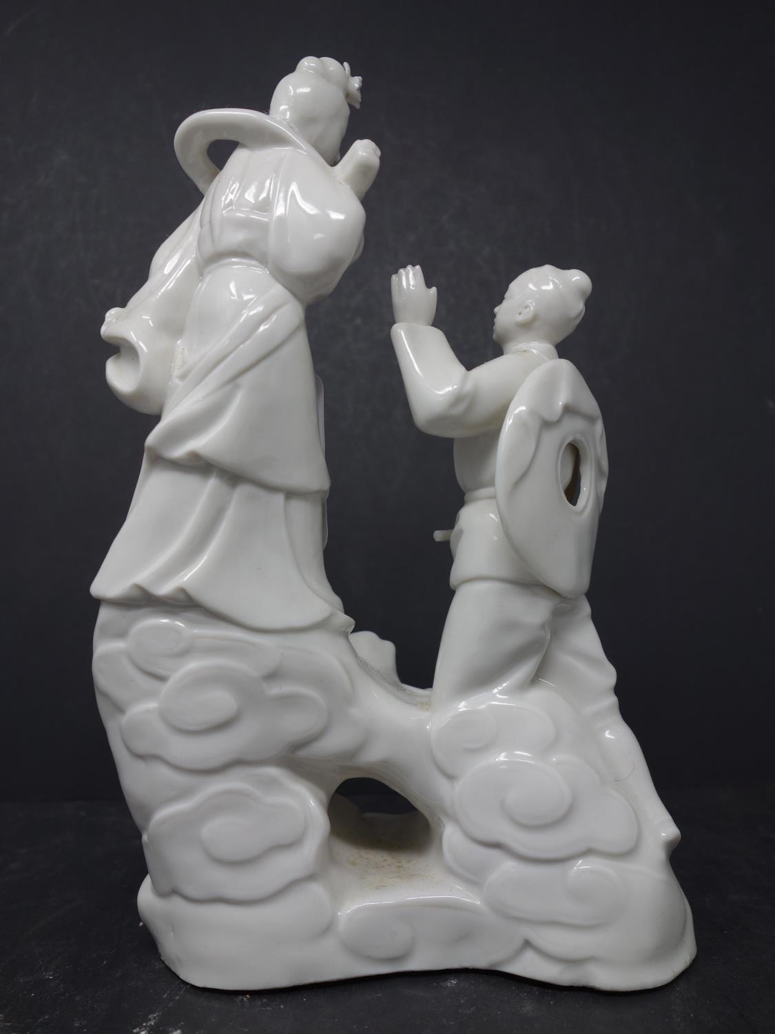 A Chinese porcelain mid-century, blanc de chine group, based on the folk tale of ?the cowherd and - Image 2 of 2