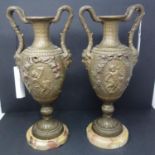 A pair of 19th century gilt bronzed Classical vases on marble plinths, H.39cm