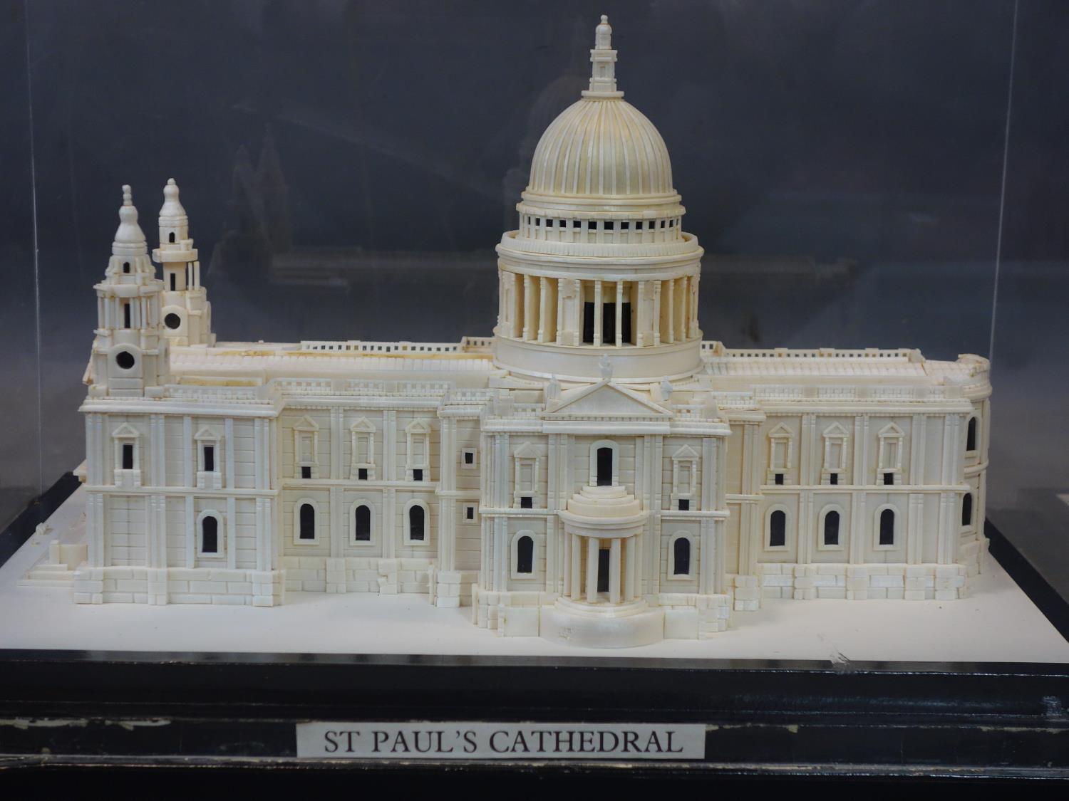A hand-built scale model of St Paul's Cathedral, under a perspex case on plinth, approx. size H.25