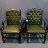 A pair of Georgian style mahogany Gainsborough armchairs, with green button back leather upholstery