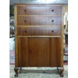 An early 20th century walnut chest of 3 drawers over cupboard door, H.118 W.78 D.45cm