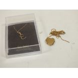 A 9CT GOLD PENDANT ON CHAIN TOGETHER WITH A YELLOW METAL HEART LOCKET STAMPED 375