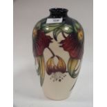 A LARGE MOORCROFT ANNA LILLY PATTERN VASE