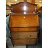 AN EARLY 20TH CENTURY MAHOGANY STUDENTS TYPE BUREAU