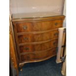 A REPRODUCTION WALNUT SERPENTINE FRONTED FOUR DRAWER CHEST W 76 CM