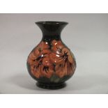 A MOORCROFT HIBISCUS PATTERN VASE