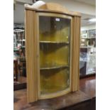 A SHAPED GLAZED PINE HANGING CORNER CABINET H 104 CM