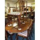A REPRODUCTION MAHOGANY TWIN PEDESTAL TABLE, SIX CHAIRS AND SIDEBOARD