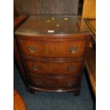 A REPRODUCTION MAHOGANY BOW FRONTED THREE DRAWER CHEST W 54 CM