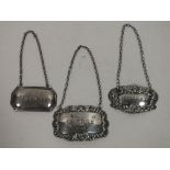 THREE HALLMARKED SILVER DECANTER LABELS