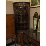 A QUALITY REPRODUCTION MAHOGANY BOW FRONTED CORNER CABINET H 181 CM