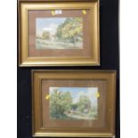 A PAIR OF GILT FRAMED AND GLAZED WATERCOLOURS SIGNED FRED C BRETTEL DEPICTING RURAL SCENES WITH
