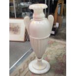 LARGE ALABASTER TWIN HANDLED URN ON A BASE