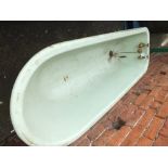 AN ANTIQUE CAST BATH