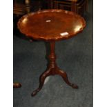 A SMALL REPRODUCTION WALNUT PEDESTAL WINE TABLE