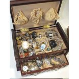 A JEWELLERY BOX AND CONTENTS