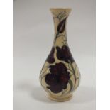 A MOORCROFT CHOCOLATE COSMOS PATTERN VASE