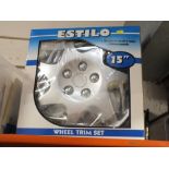 A BOXED SET OF 15" WHEEL TRIMS