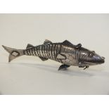 A SMALLER CONTINENTAL SILVER ARTICULATED FISH SPICE CONTAINER, L 12 CM