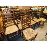 A MATCHED SET OF TEN OAK WICKER SEAT DINING CHAIRS A/F (10)