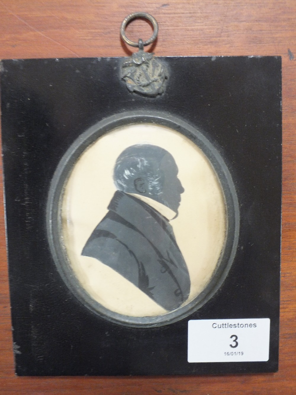 AN ANTIQUE MINIATURE SILHOUETTE OF A GENTLEMAN