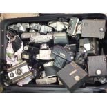 A SUITCASE CONTAINING A LARGE QUANTITY OF VINTAGE CAMERAS