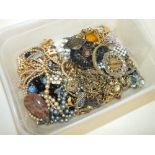 A TUB OF COSTUME JEWELLERY