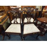 A SET OF FOUR REPRODUCTION MAHOGANY CHIPPENDALE DESIGN DINING CHAIRS